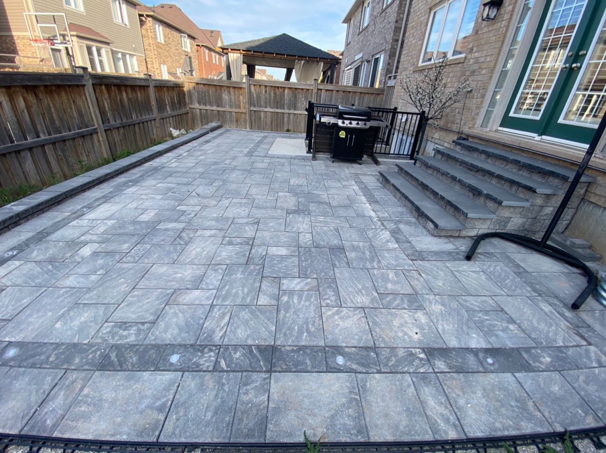 Interlock walkway pavers in a garden setting